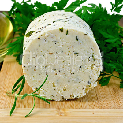 cheese homemade with spices on board