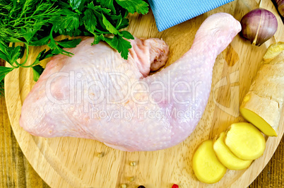 chicken leg with ginger on the board