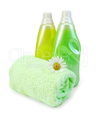 fabric softener in two bottles with chamomile