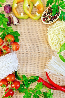 frame of vegetables and funchozy on sacking