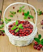lingonberries in a white wicker basket