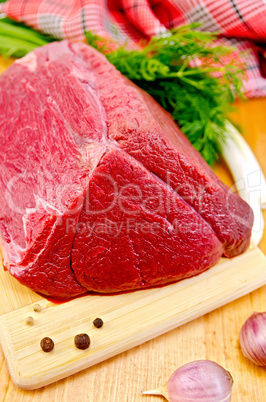 meat of a beef on the board in one piece