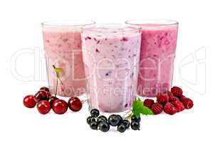 milk shakes with berries in glass