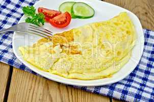 omelette with vegetables on the board