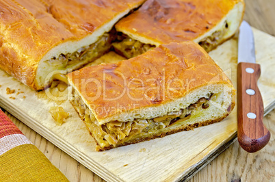 pie with cabbage and chanterelles on the board