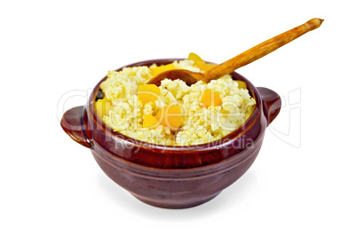 porridge millet with pumpkin and spoon in pottery