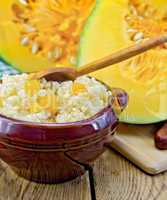 porridge millet with pumpkin and spoon