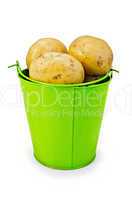 potatoes yellow in a green bucket
