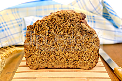 rye homemade bread on a wooden stand
