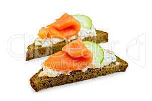sandwiches on bread with salmon and cucumber