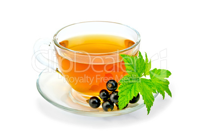 tea with black currants in a cup