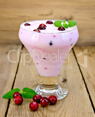 yogurt thick with cranberries on the board