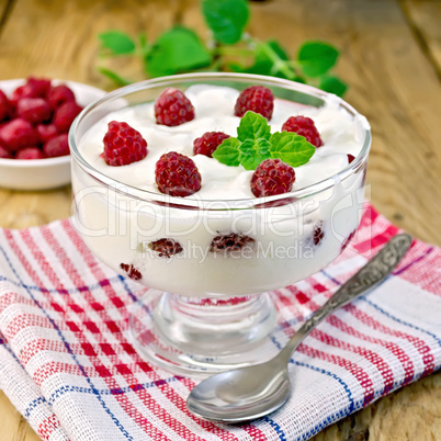 yogurt thick with raspberries and mint on the board