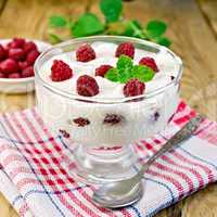 yogurt thick with raspberries and mint on the board