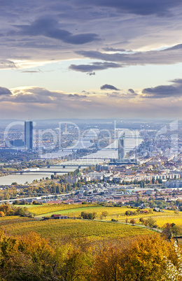 Cityscape of Vienna and Danube in the autumn at dusk