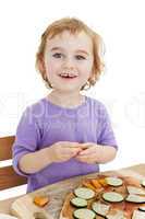 cute laughing girl making pizza