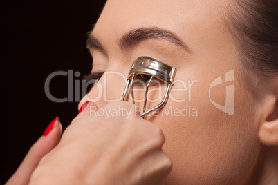 Beauty stylist applying eye make-up