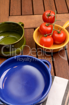 empty plates on a wooden table