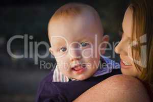 cute red head infant boy portrait with his mother