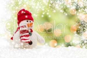 cute snowman over abstract snow and light background