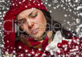 sick woman with tissue and snow effect surrounding