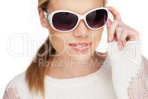 young blond woman with sunglases,