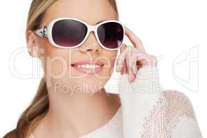 young blond woman with sunglases,