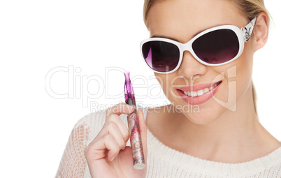 young woman smokin electic cigarette