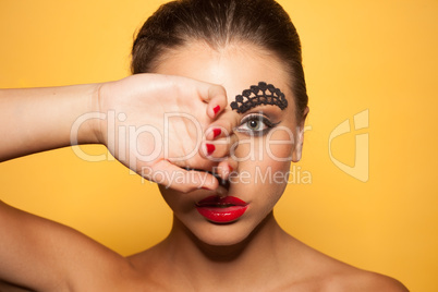 beauty portrait of a woman covering the eye