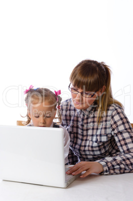 mother and daughter on the computer.