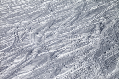 background of ski slope with trace from ski and snowboards