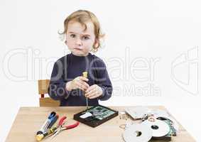 child repairing computer part
