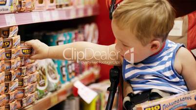 Little boy in the shop.