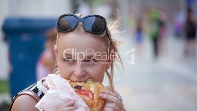 Young woman eating.
