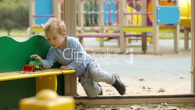 Young boy playing outdoors