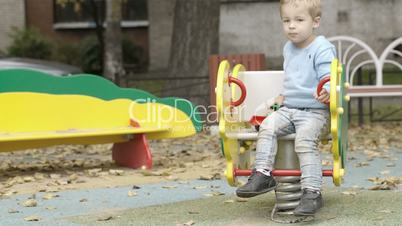 Little boy on the playground.