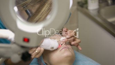 Ultrasonic and laser face treatment