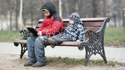 Two brothers with tablet computer