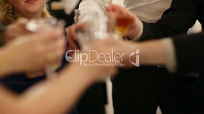 group of people toasting at a celebration
