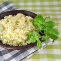 Couscous in a wooden bowl
