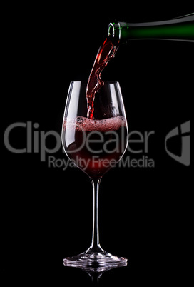 Wine being poured into a glass