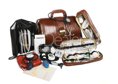 doctors brown leather bag with stethoscope and other medical equ