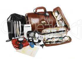 doctors brown leather bag with stethoscope and other medical equ