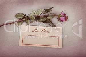 love letter in vintage style with a rose