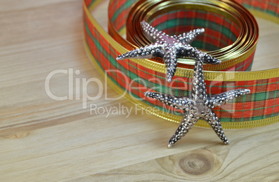Decorative ribbon and stars as christmas decoration