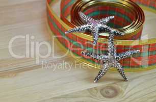 Decorative ribbon and stars as christmas decoration