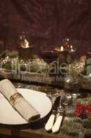 christmas table in candlelight