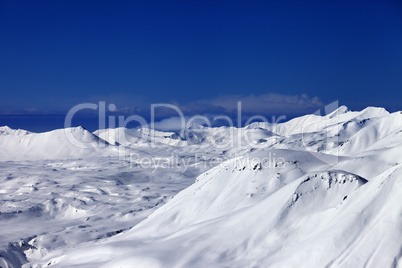 off-piste slope and snowy plateau at nice day