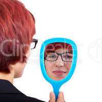 woman looking in the hand mirror