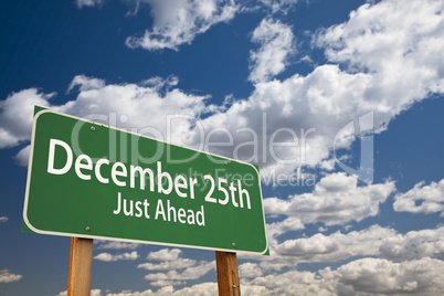 december 25th just ahead green road sign over sky